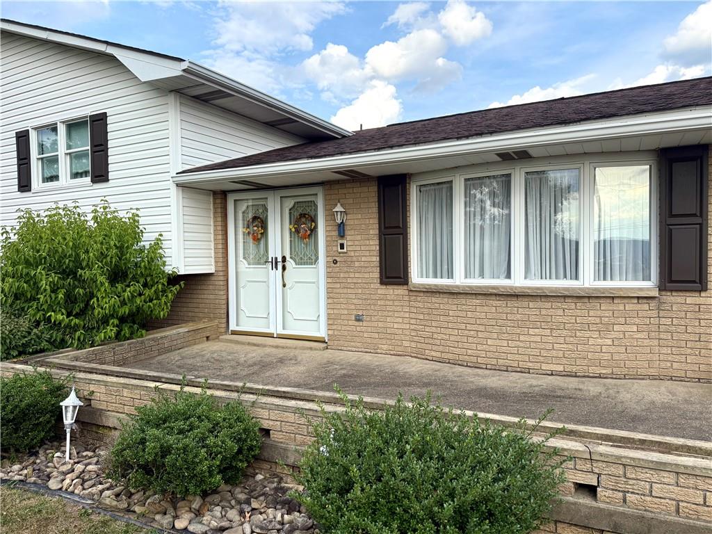 224 Rehoboth Road Belle Vernon, PA 15012 - Photo 2 of 46 a front view of a house with a yard