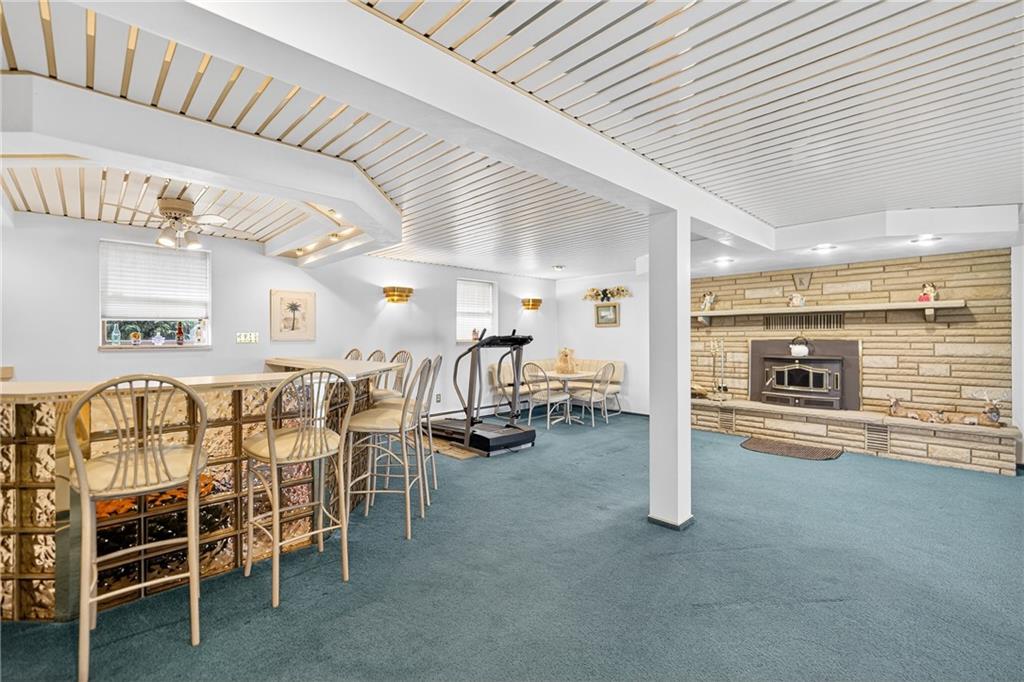 224 Rehoboth Road Belle Vernon, PA 15012 - Photo 22 of 46 a dining room with furniture and a kitchen view