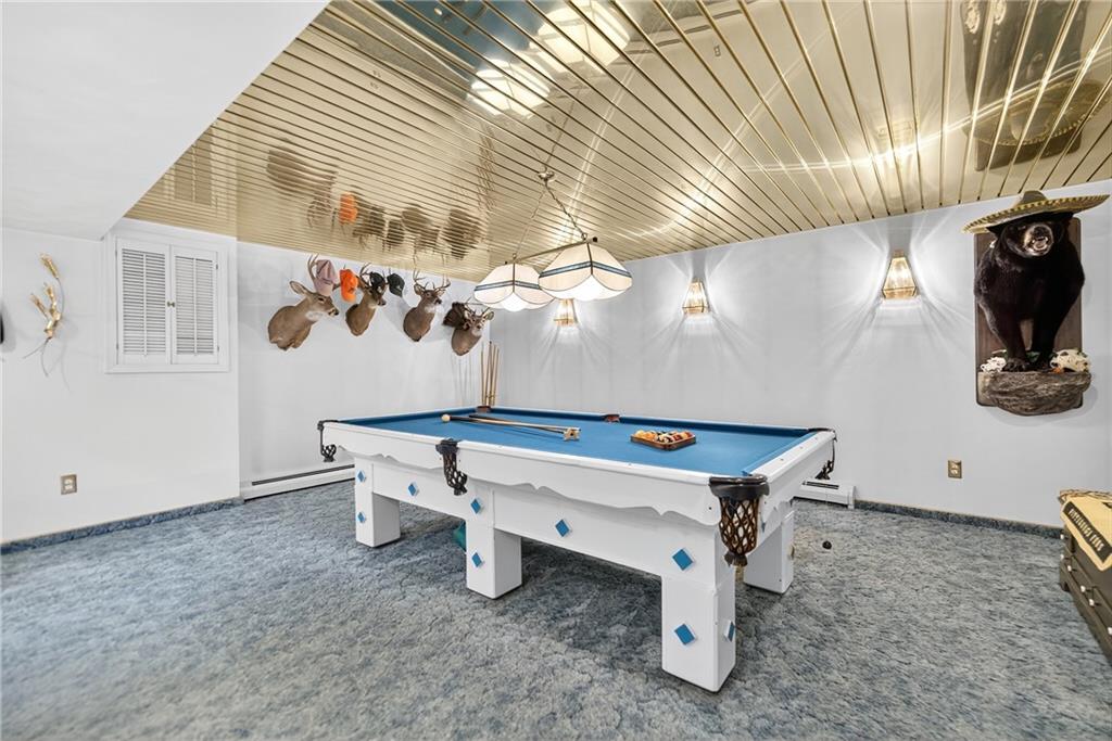 224 Rehoboth Road Belle Vernon, PA 15012 - Photo 29 of 46 a room with gym equipment and a table