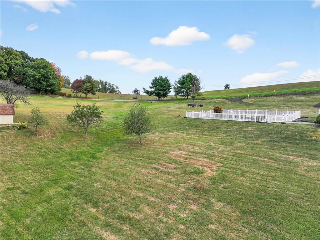 224 Rehoboth Road Belle Vernon, PA 15012 - Photo 40 of 46 a view of a lake with a big yard