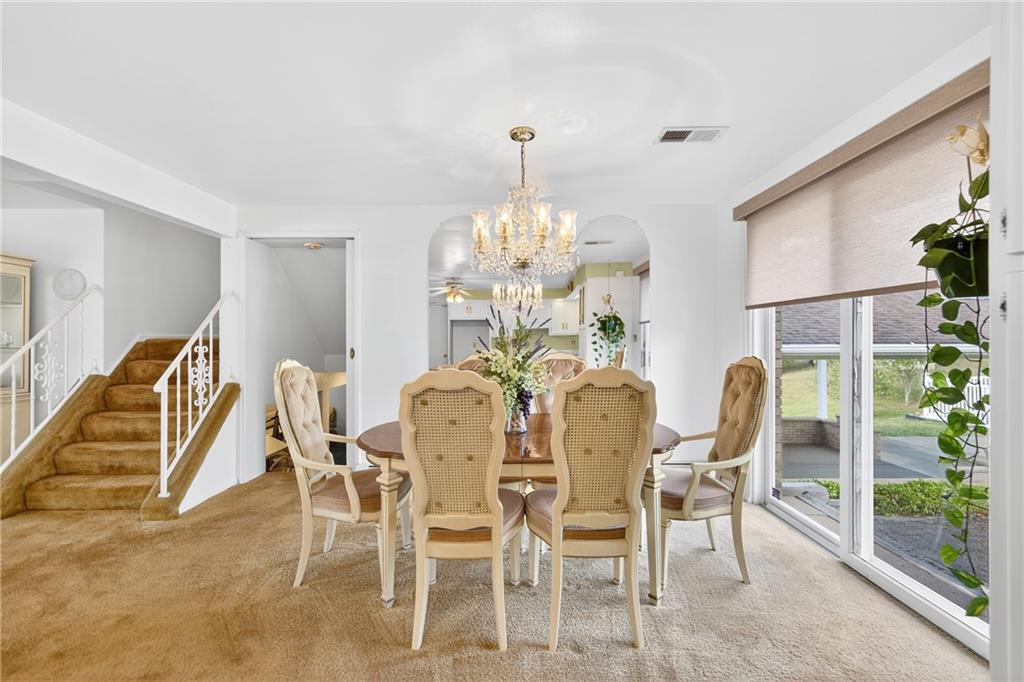 224 Rehoboth Road Belle Vernon, PA 15012 - Photo 5 of 46 a view of a dining room with furniture and chandelier