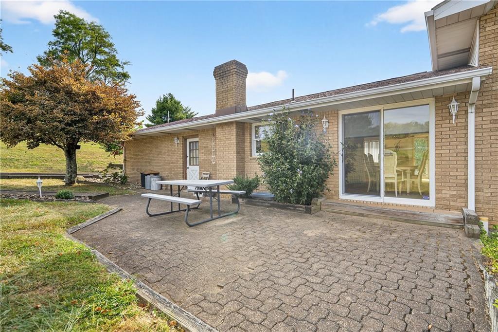 224 Rehoboth Road Belle Vernon, PA 15012 - Photo 6 of 46 a view of a house with backyard and sitting area