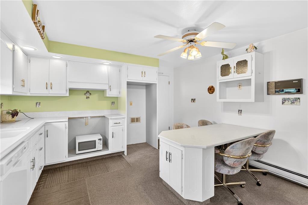 224 Rehoboth Road Belle Vernon, PA 15012 - Photo 8 of 46 a utility room with cabinets dryer and washer