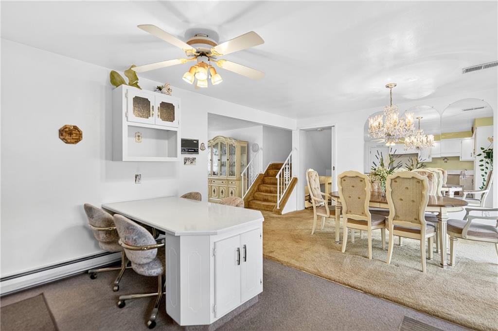 224 Rehoboth Road Belle Vernon, PA 15012 - Photo 10 of 46 a view of a dining room with furniture and chandelier