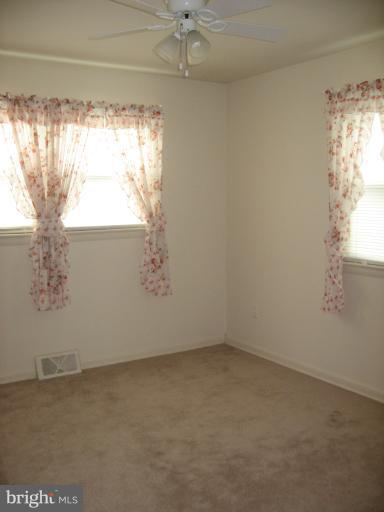 800 Boom Road Berryville, VA 22611 - Photo 5 of 13 a view of empty room with window