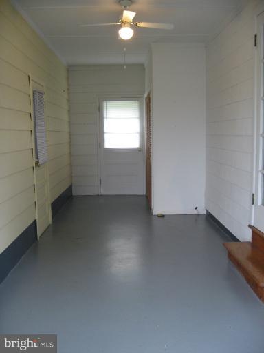 800 Boom Road Berryville, VA 22611 - Photo 9 of 13 an empty room with a empty space and a window