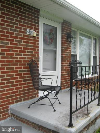 800 Boom Road Berryville, VA 22611 - Photo 10 of 13 a view of house with outdoor seating