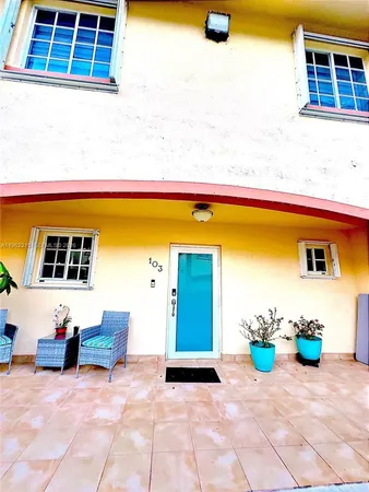 a view of a lounge chairs in the patio