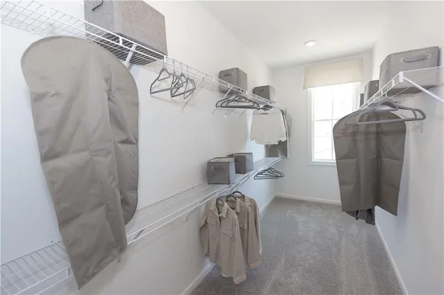 a view of storage and utility room with a sink