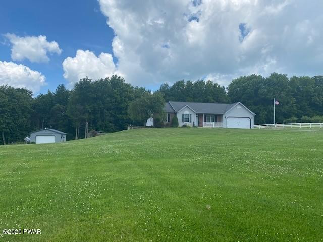 63 Callapoose Road Moscow, PA 18444 - Photo 2 of 73 a view of house with garden