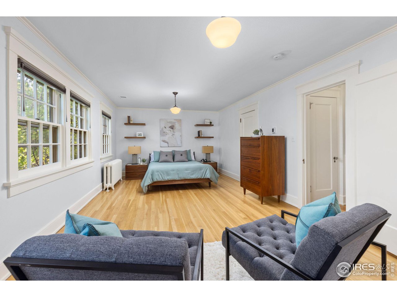 1064 10th Street Boulder, CO 80302 - Photo 14 of 40 a living room with furniture rug and wooden floor