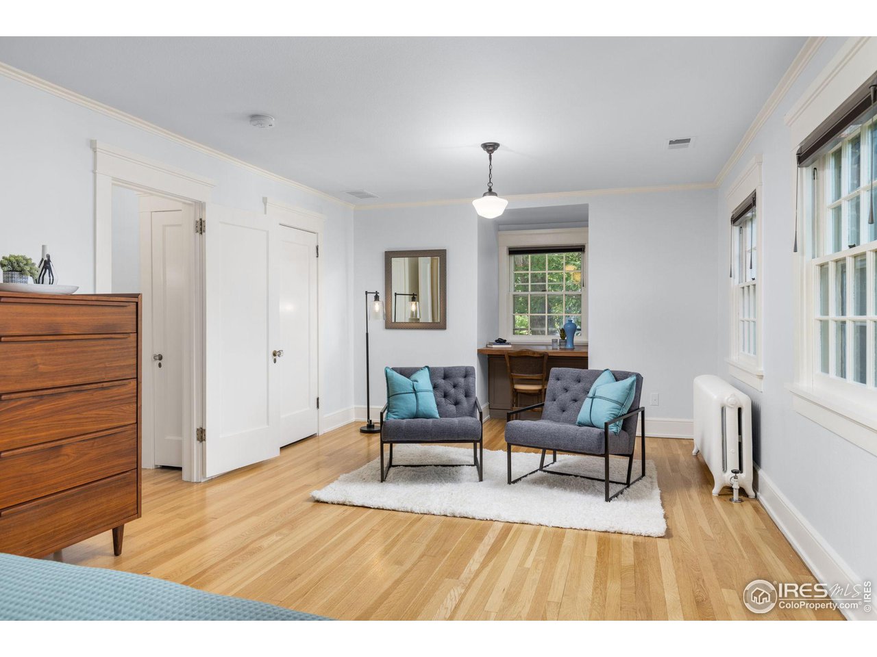1064 10th Street Boulder, CO 80302 - Photo 15 of 40 a living room with furniture and a wooden floor