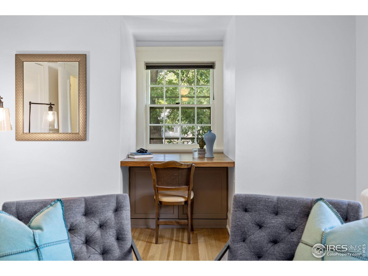 1064 10th Street Boulder, CO 80302 - Photo 16 of 40 a living room with furniture and a window