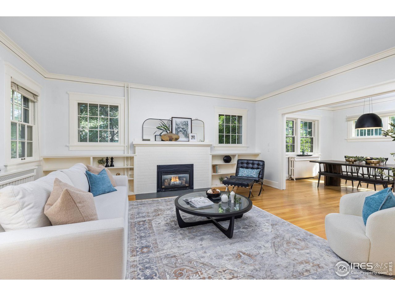 1064 10th Street Boulder, CO 80302 - Photo 2 of 40 a living room with furniture and a fireplace