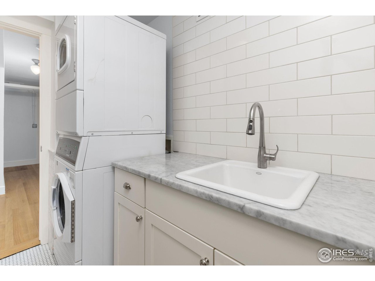 1064 10th Street Boulder, CO 80302 - Photo 25 of 40 a bathroom with a sink and vanity