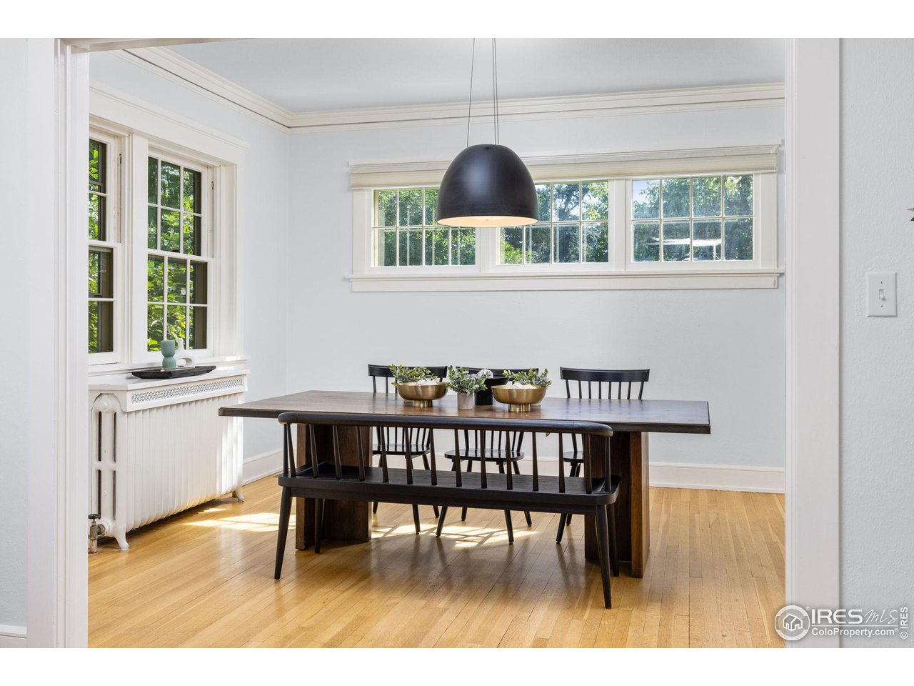 1064 10th Street Boulder, CO 80302 - Photo 4 of 40 a view of a dining room with furniture and window