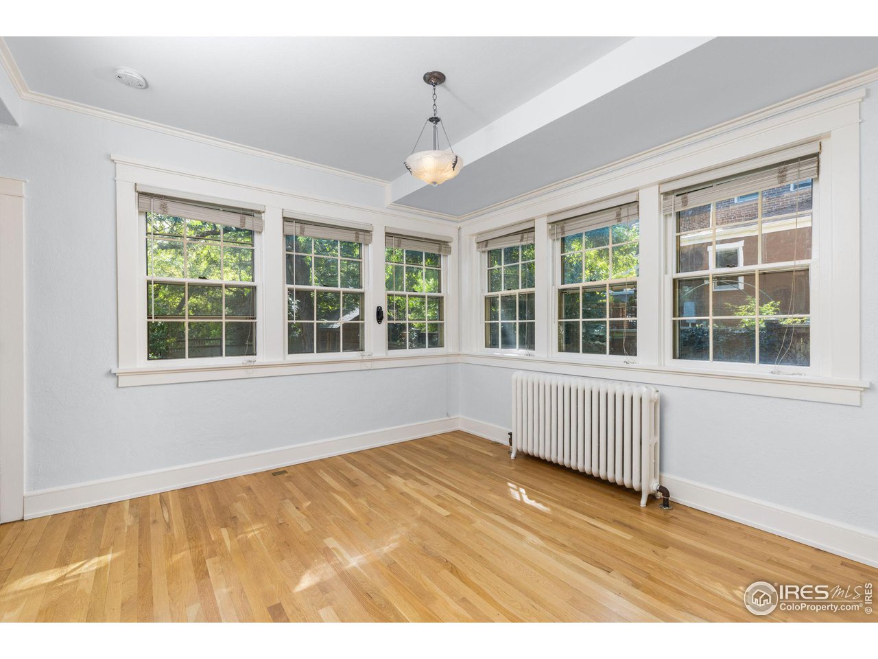 1064 10th Street Boulder, CO 80302 - Photo 8 of 40 a view of an empty room with a window