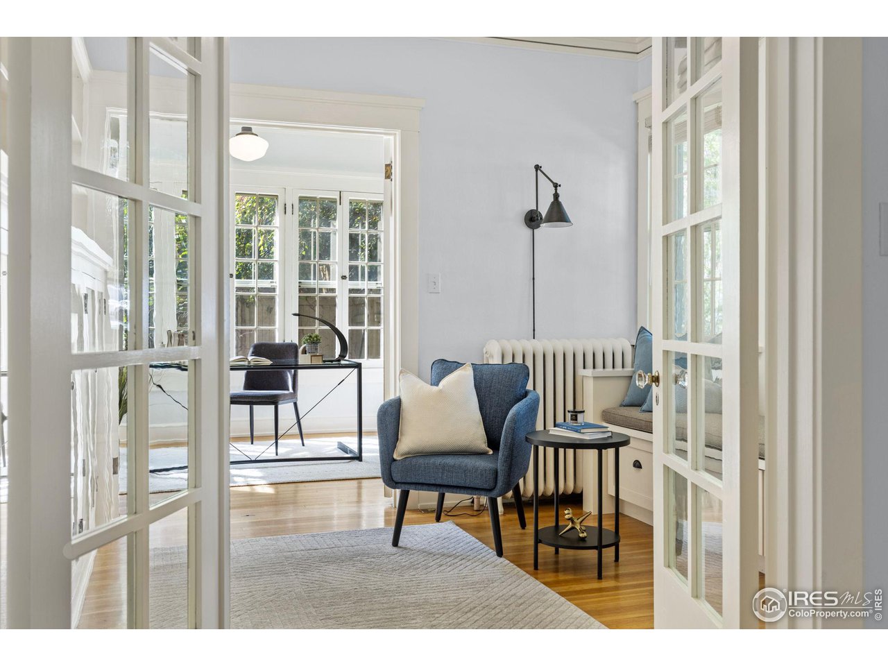 1064 10th Street Boulder, CO 80302 - Photo 10 of 40 a balcony with table and chairs