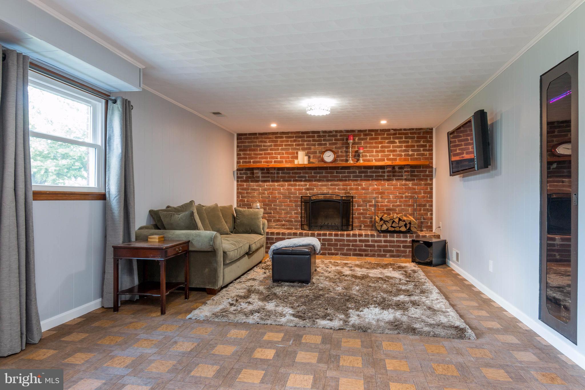 2520 Uniontown Road Westminster, MD 21158 - Photo 21 of 24 Large Family Room with Wood Burning Fireplace