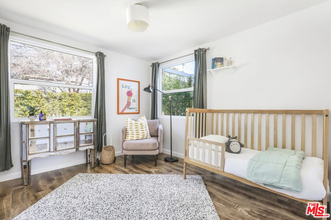 114 Hackett Place Los Angeles, CA 90042 - Photo 18 of 30 a living room with furniture and a large window