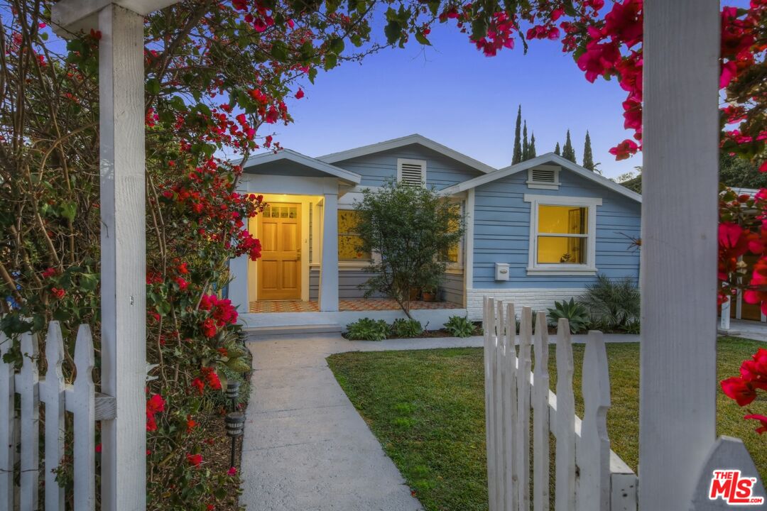 114 Hackett Place Los Angeles, CA 90042 - Photo 2 of 30 a front view of a house with a porch
