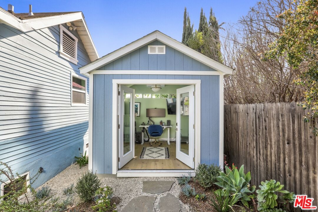 114 Hackett Place Los Angeles, CA 90042 - Photo 26 of 30 a front view of a house with a yard