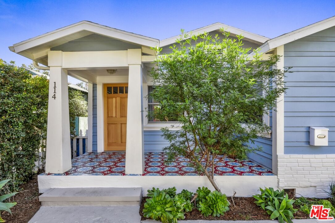 114 Hackett Place Los Angeles, CA 90042 - Photo 6 of 30 a front view of a house with garden