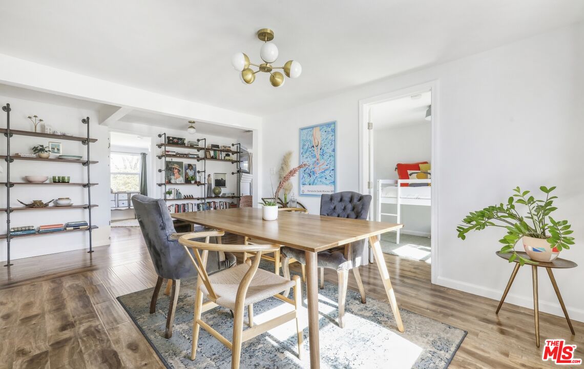 114 Hackett Place Los Angeles, CA 90042 - Photo 10 of 30 a view of a dining room with furniture and wooden floor