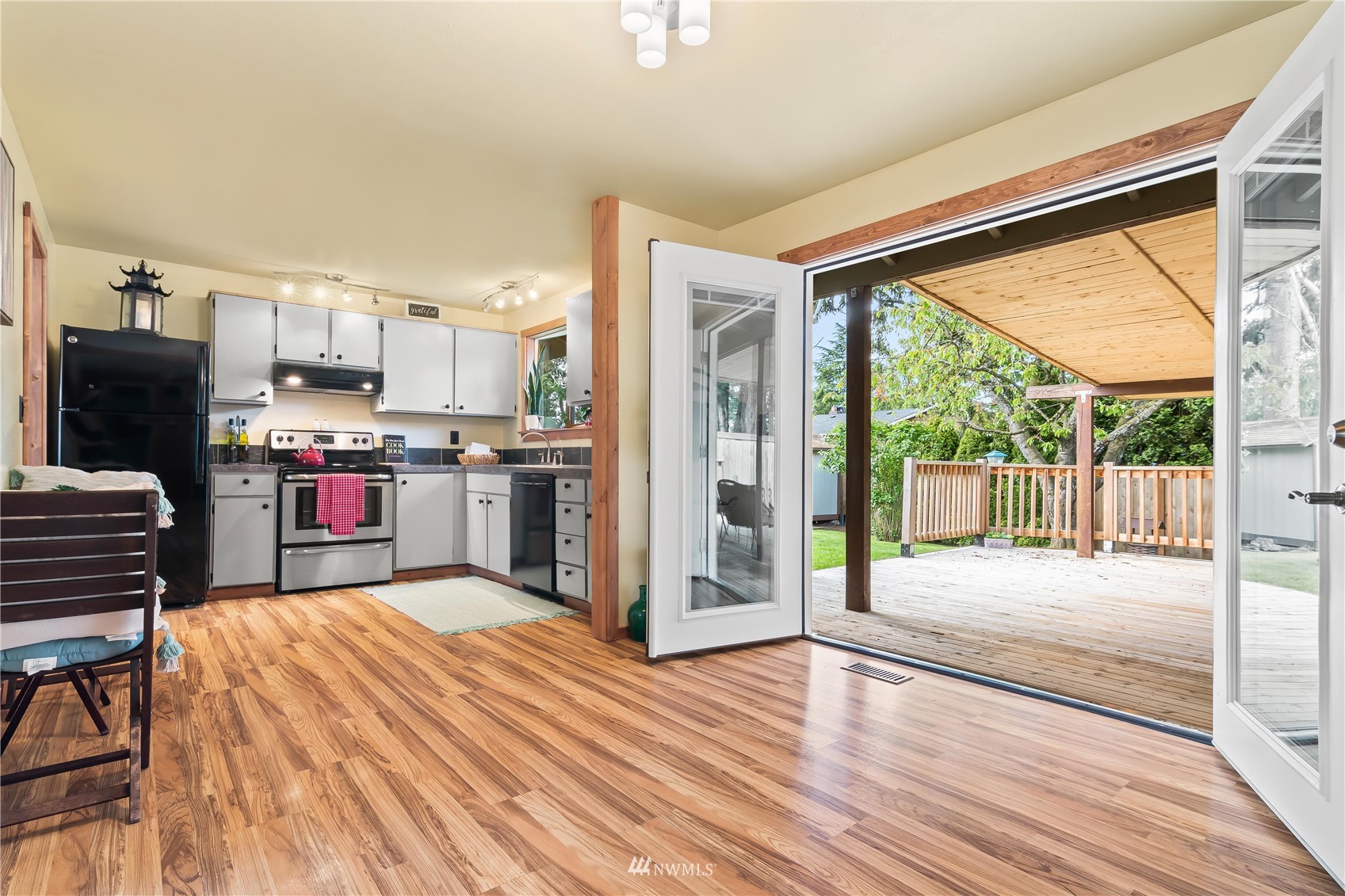 28513 24th Avenue South Federal Way, WA 98003 - Photo 11 of 31 a open kitchen with stainless steel appliances granite countertop a stove and refrigerator