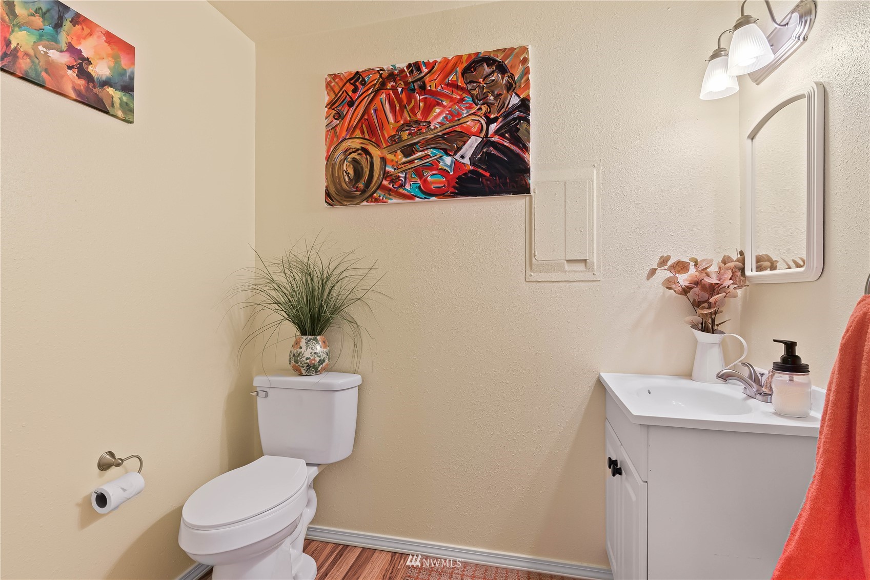 28513 24th Avenue South Federal Way, WA 98003 - Photo 13 of 31 a bathroom with a toilet a sink and mirror