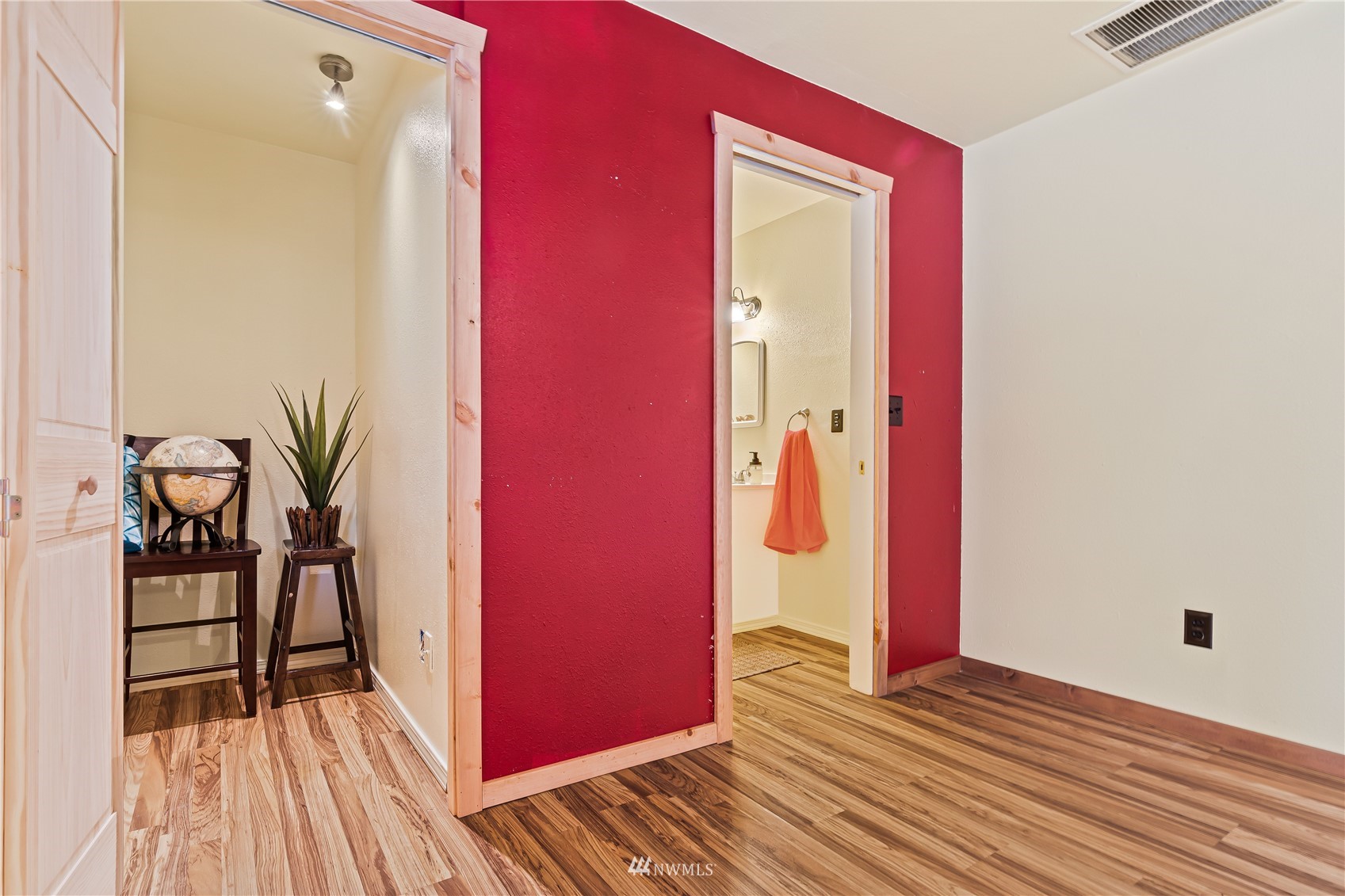 28513 24th Avenue South Federal Way, WA 98003 - Photo 14 of 31 a view of a room with wooden floor and a potted plant
