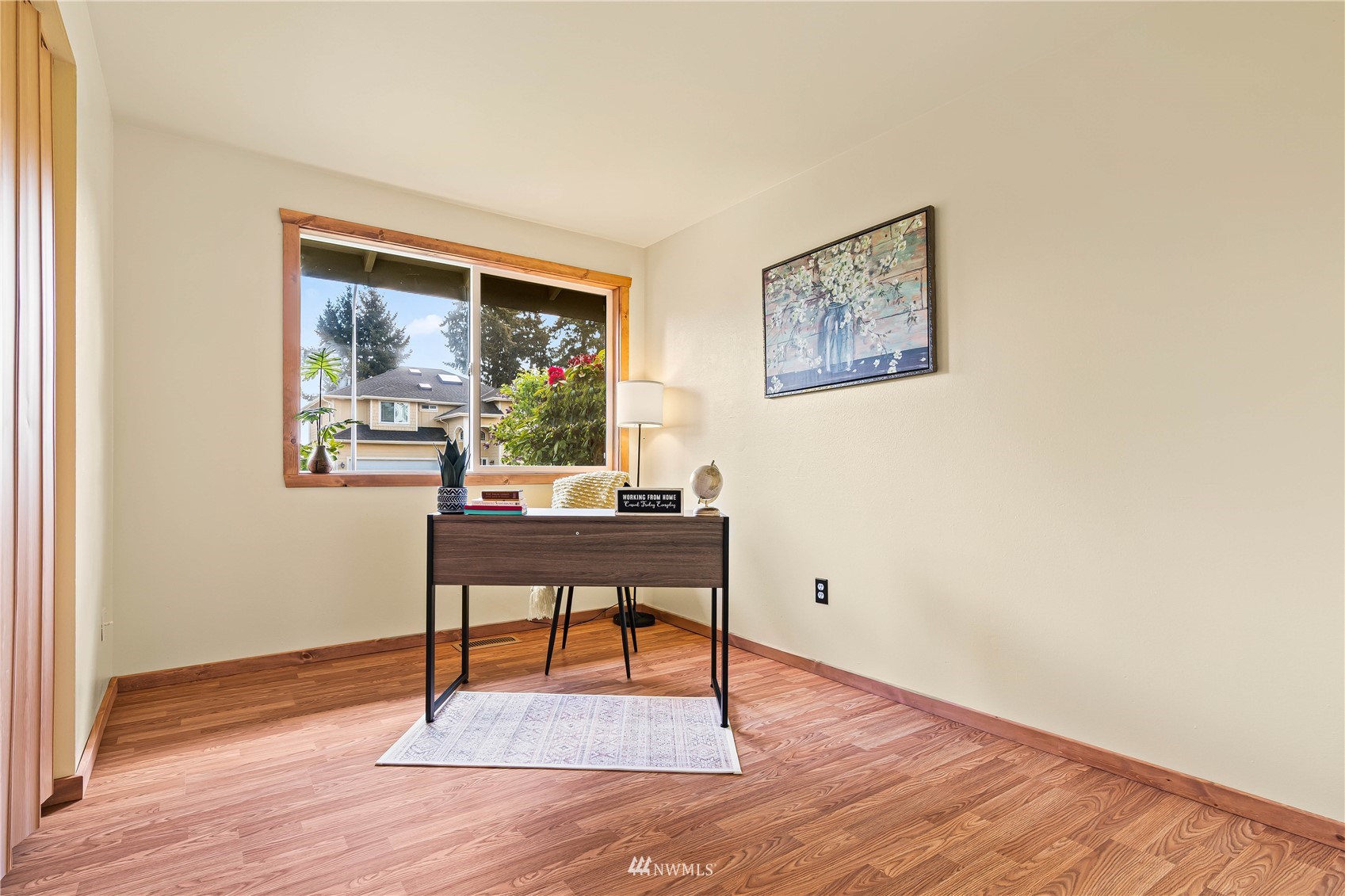 28513 24th Avenue South Federal Way, WA 98003 - Photo 15 of 31 a view of a livingroom with wooden floor and a workspace