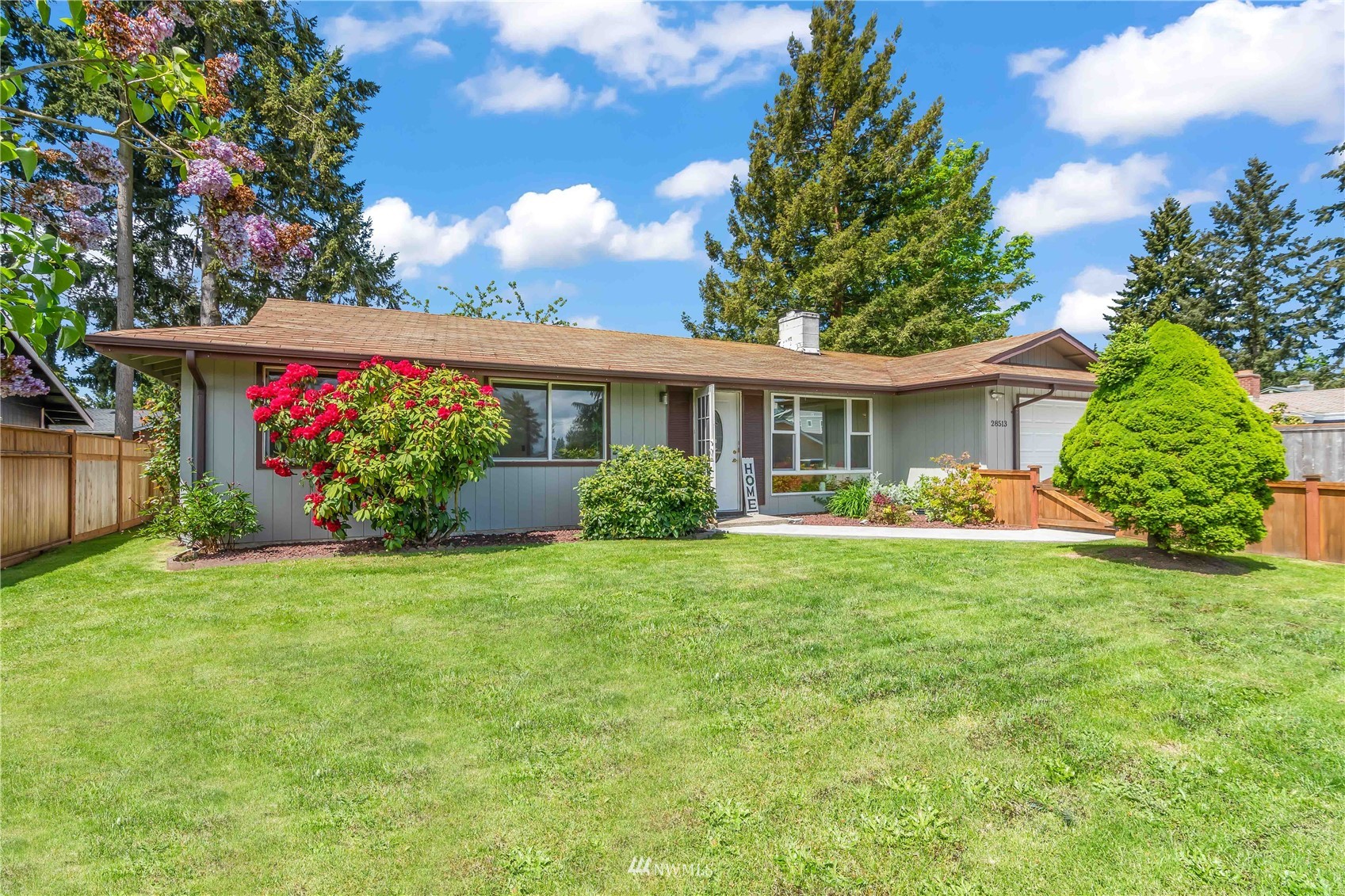 28513 24th Avenue South Federal Way, WA 98003 - Photo 3 of 31 a view of a house with a yard and potted plants