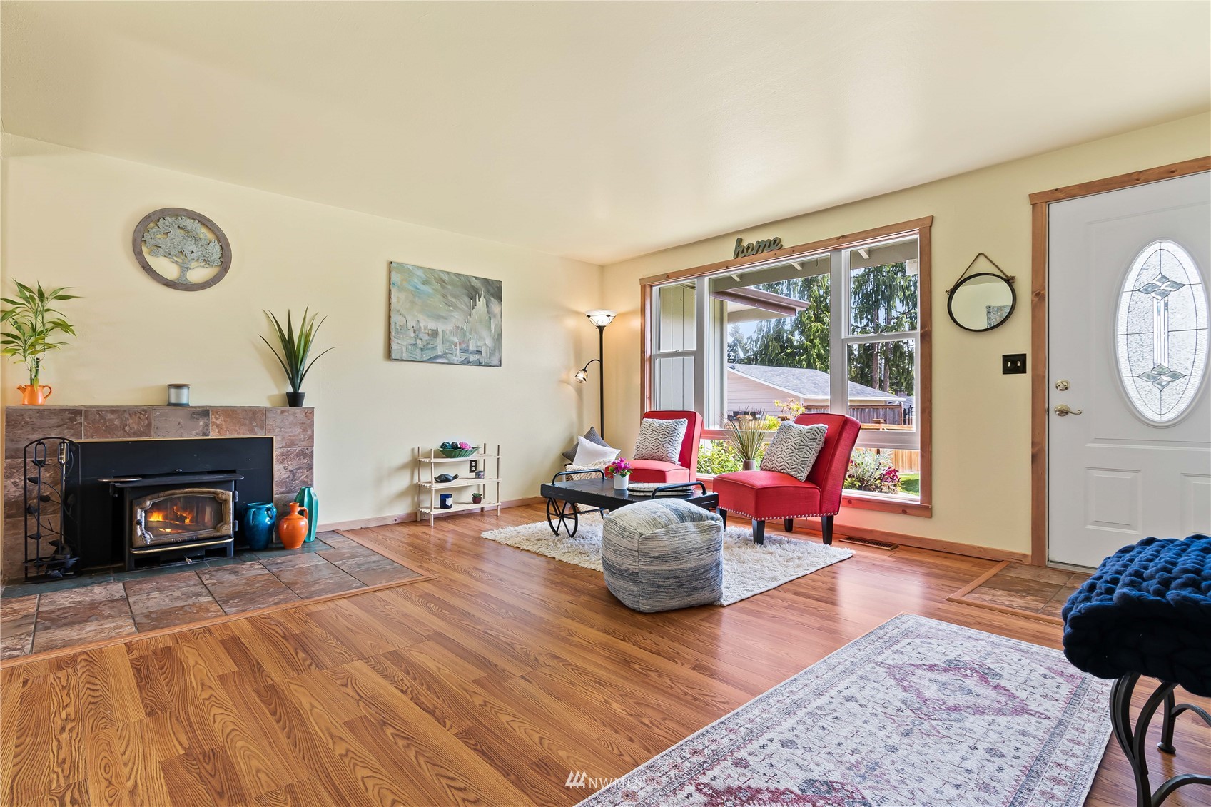 28513 24th Avenue South Federal Way, WA 98003 - Photo 5 of 31 a living room with furniture and a fireplace