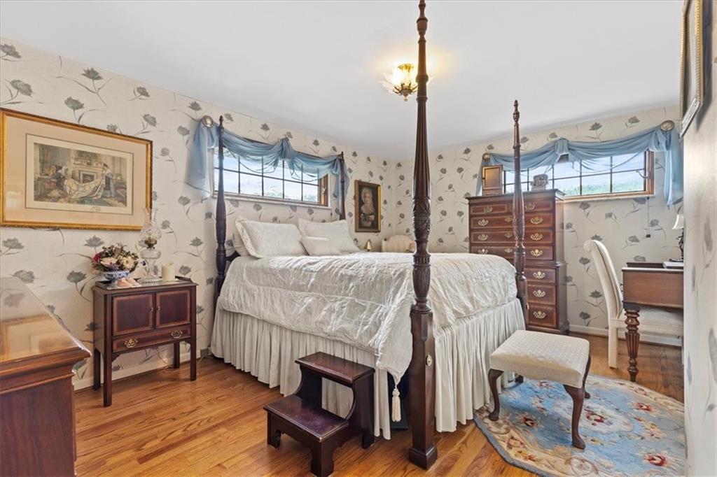 100 Morelli Drive Pittsburgh, PA 15237 - Photo 16 of 46 a bedroom with a bed a table and chair