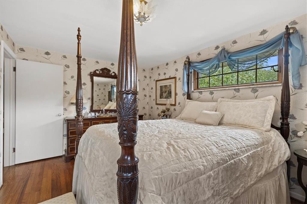 100 Morelli Drive Pittsburgh, PA 15237 - Photo 17 of 46 a bed room with a bed window and a mirror