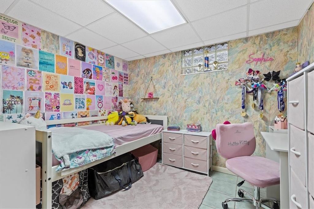 100 Morelli Drive Pittsburgh, PA 15237 - Photo 26 of 46 a bedroom with a bed and a dresser in it