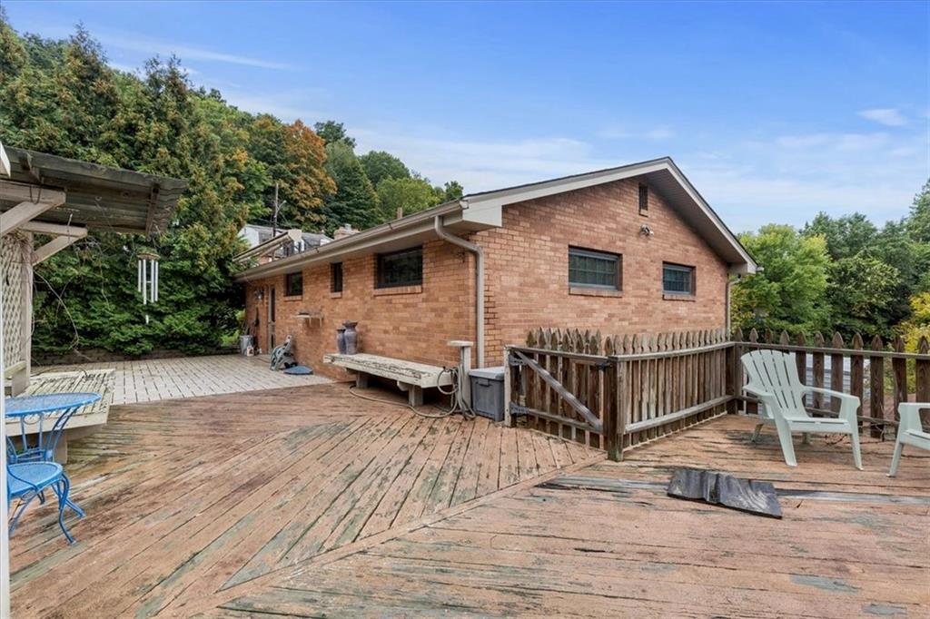 100 Morelli Drive Pittsburgh, PA 15237 - Photo 33 of 46 a view of a house with a wooden deck