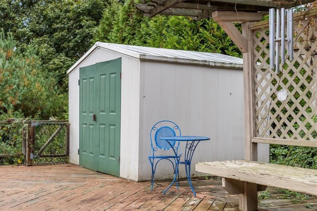 100 Morelli Drive Pittsburgh, PA 15237 - Photo 34 of 46 a backyard of a house with table and chairs