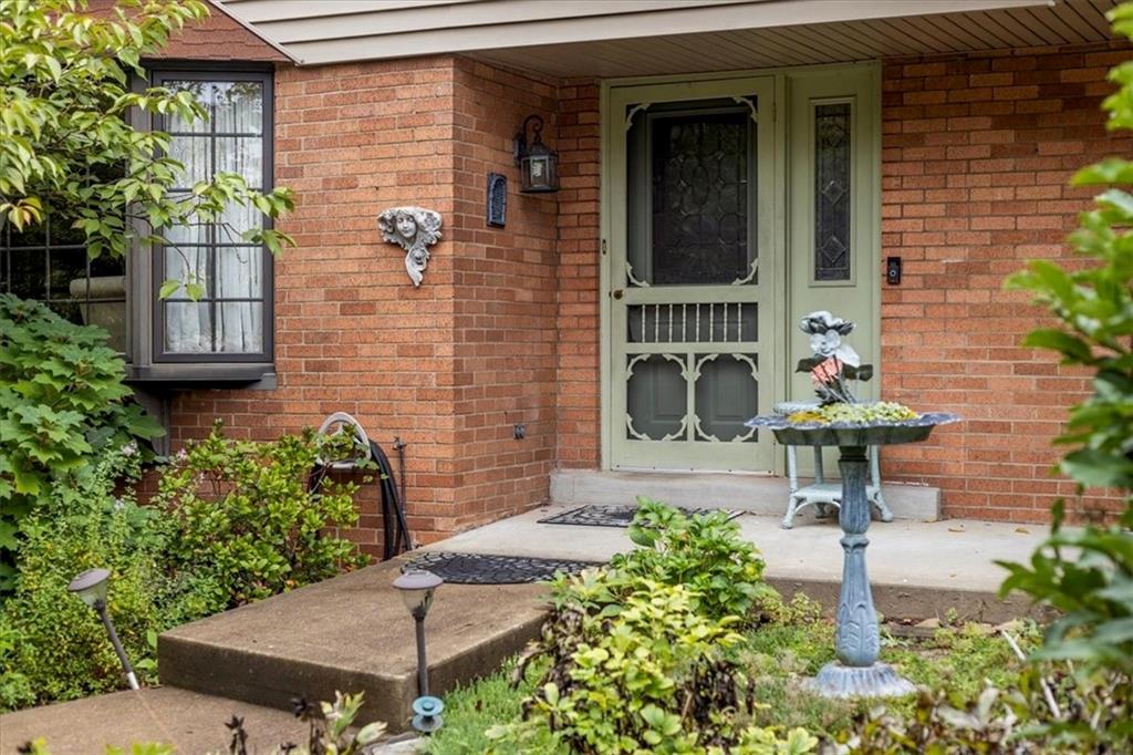 100 Morelli Drive Pittsburgh, PA 15237 - Photo 40 of 46 a front view of a house with garden