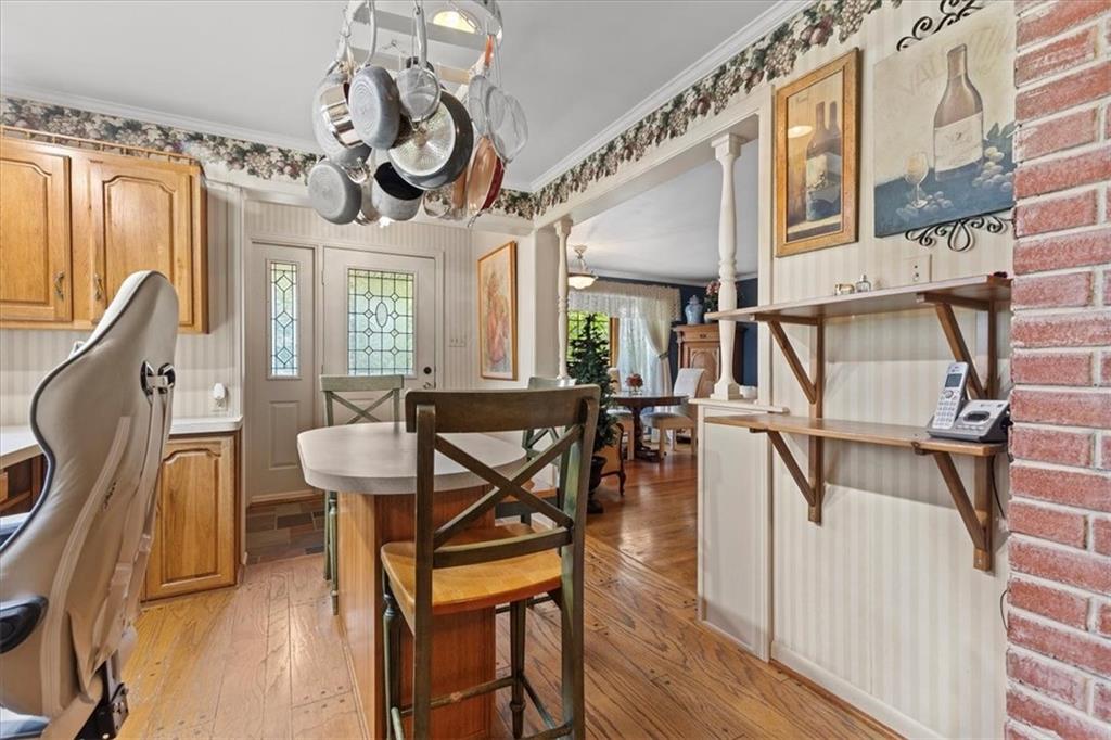 100 Morelli Drive Pittsburgh, PA 15237 - Photo 5 of 46 a view of a dining room with furniture and a chandelier