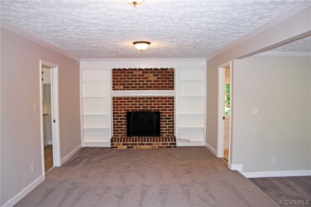 4009 Hidden Valley Road Chester, VA 23831 - Photo 14 of 22 a view of an empty room with a fireplace