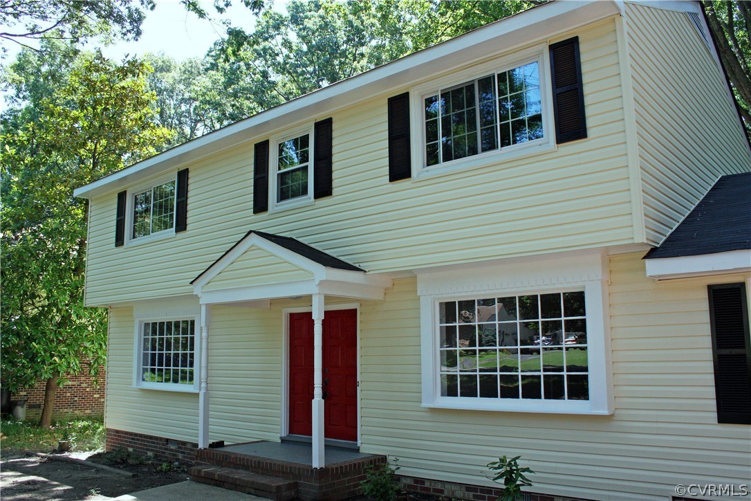 4009 Hidden Valley Road Chester, VA 23831 - Photo 2 of 22 a front view of a house with windows