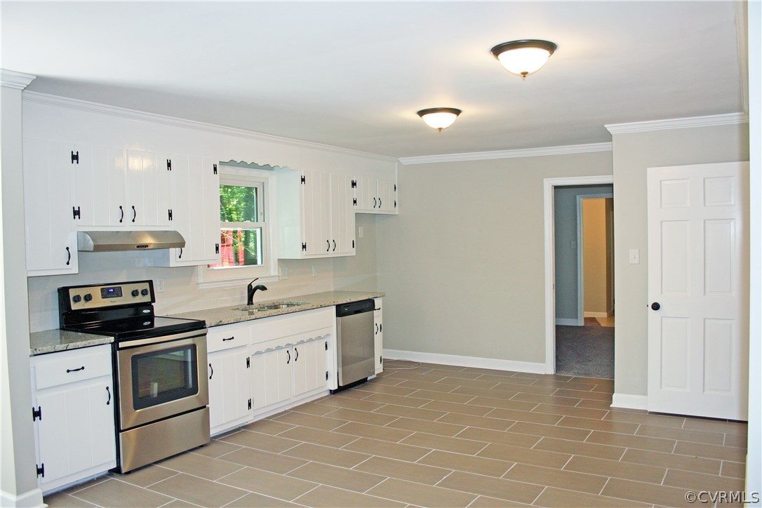 4009 Hidden Valley Road Chester, VA 23831 - Photo 4 of 22 a kitchen with stainless steel appliances a stove sink and cabinets