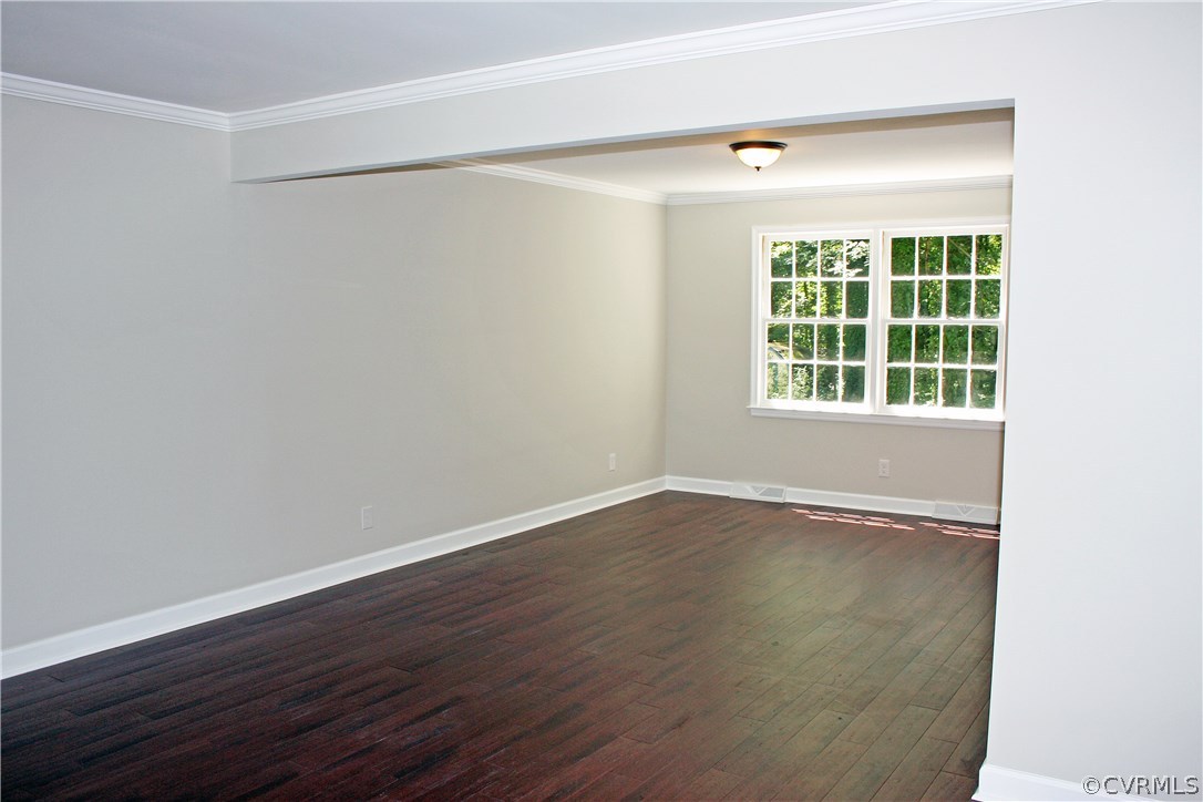 4009 Hidden Valley Road Chester, VA 23831 - Photo 6 of 22 an empty room with wooden floor and windows