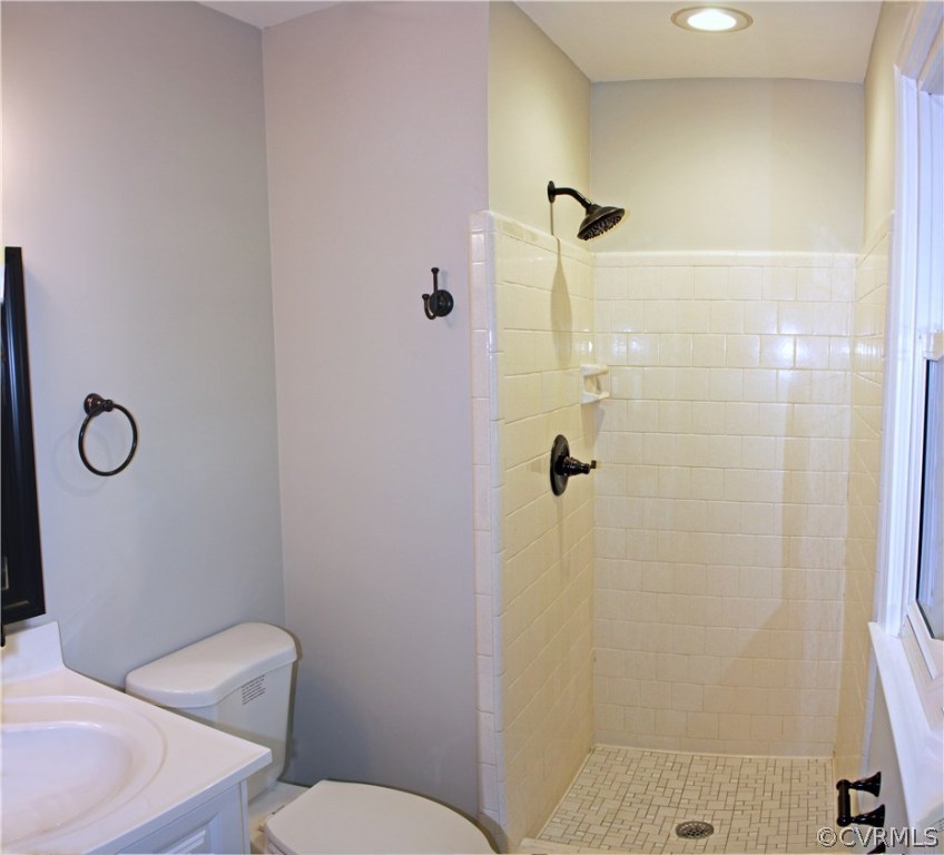 4009 Hidden Valley Road Chester, VA 23831 - Photo 7 of 22 a bathroom with a toilet and a shower