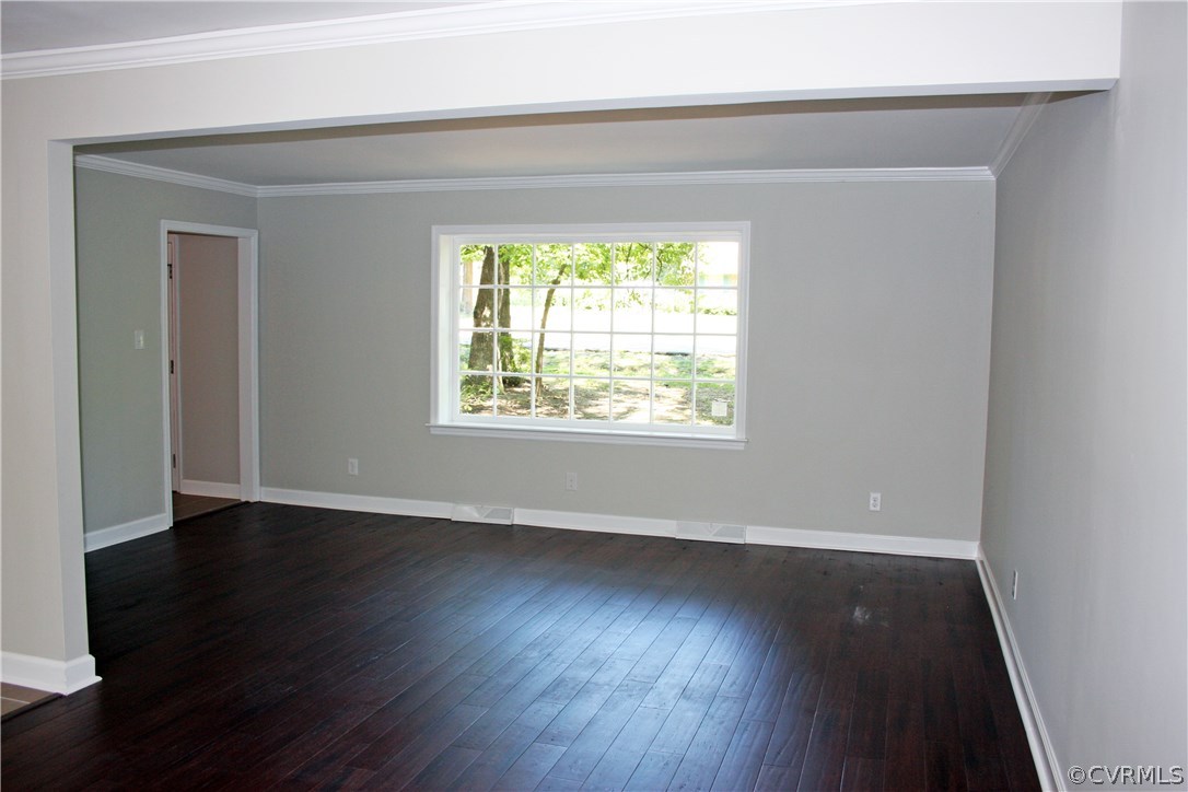 4009 Hidden Valley Road Chester, VA 23831 - Photo 9 of 22 an empty room with wooden floor and windows