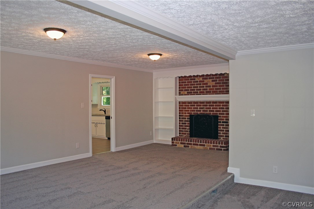 4009 Hidden Valley Road Chester, VA 23831 - Photo 10 of 22 a view of an empty room with a fireplace