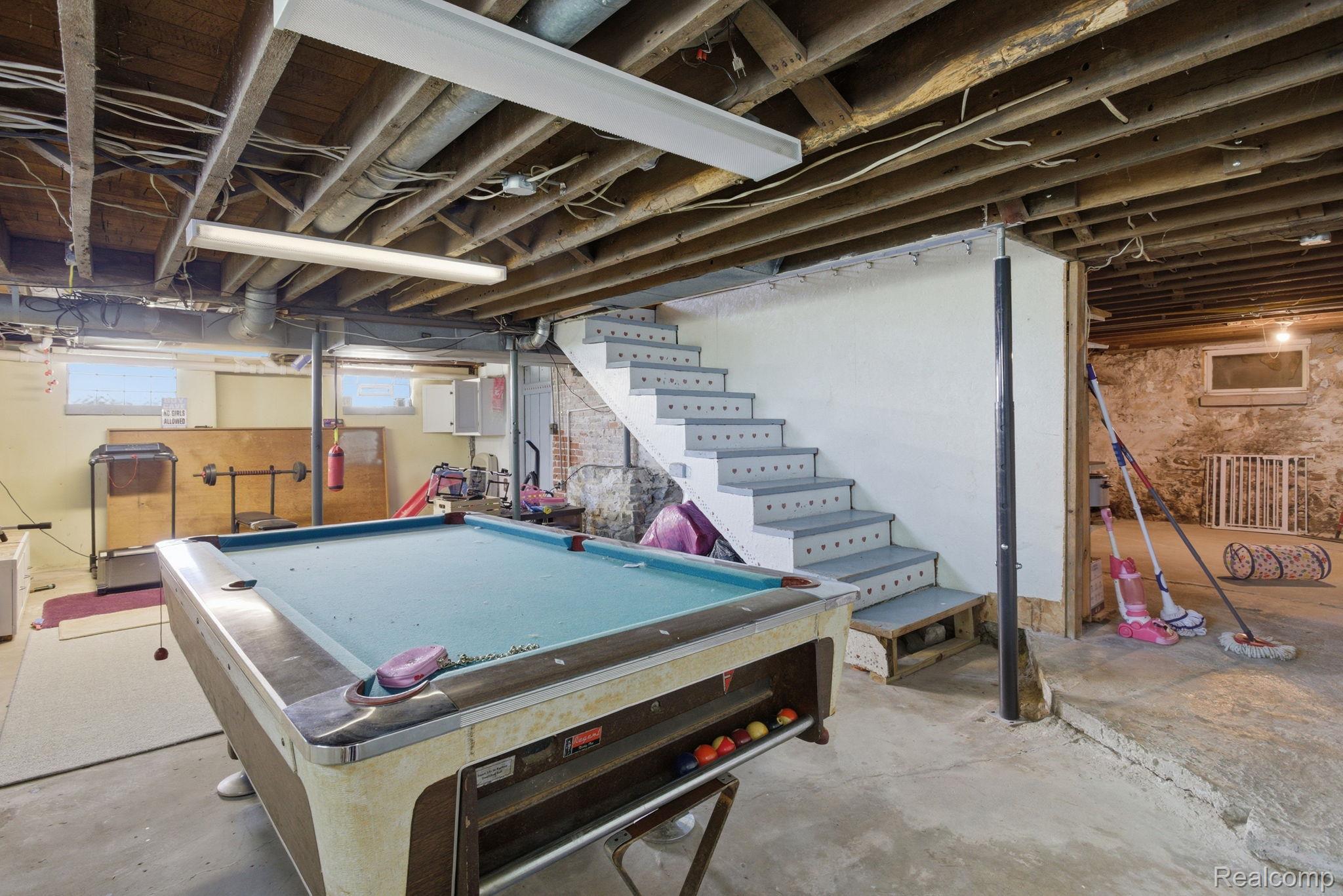 14104 Carleton West Road Carleton, MI 48117 - Photo 38 of 58 Playroom featuring billiards table and unfinished concrete floors