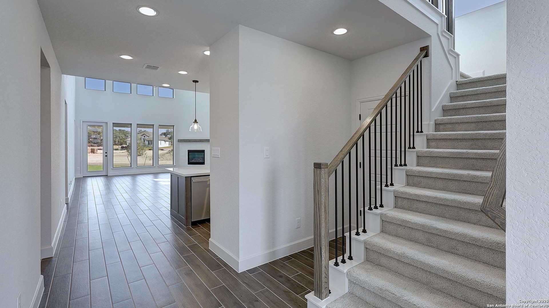 233 Hidalgo Boerne, TX 78006 - Photo 14 of 32 a view of entryway with wooden floor